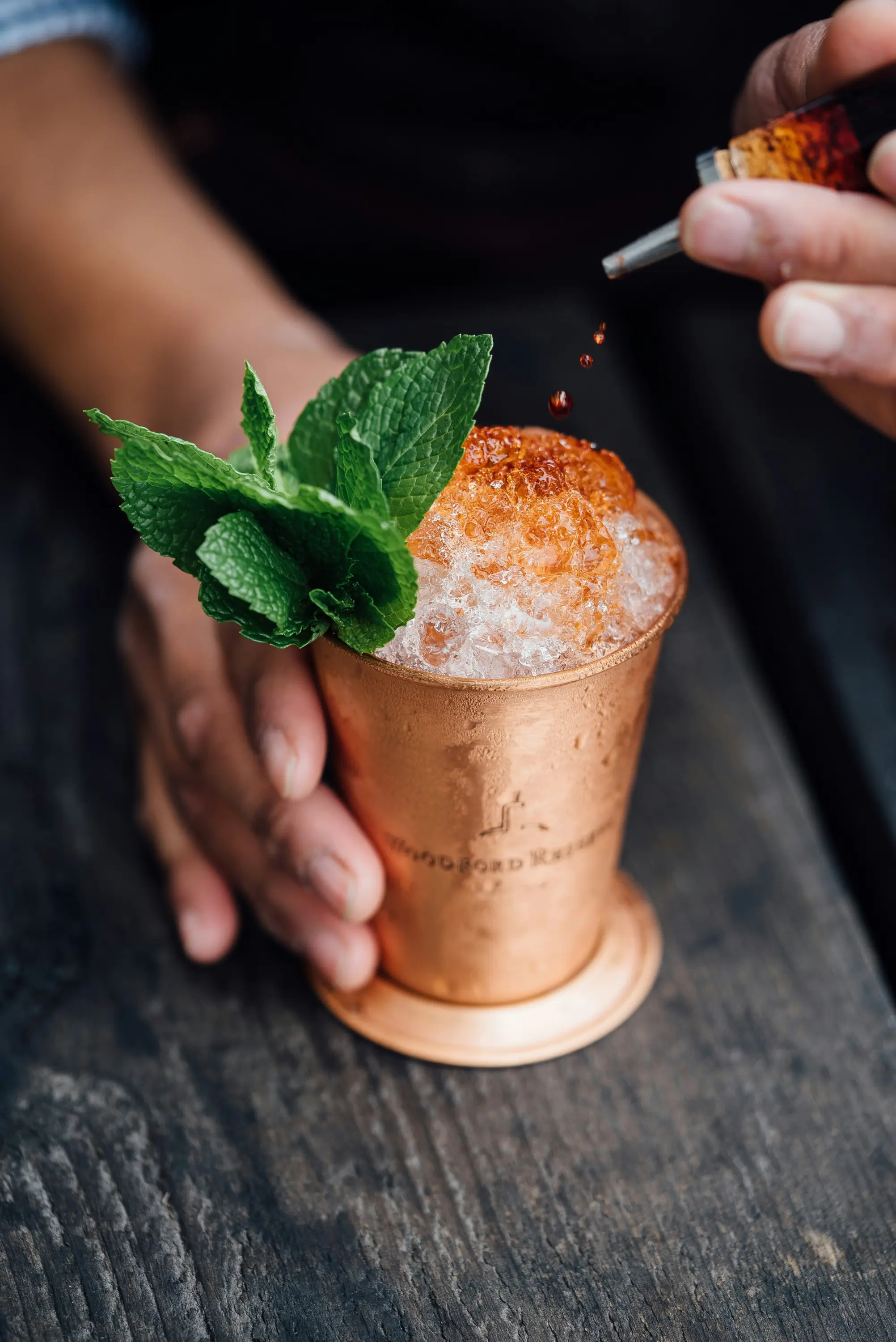 A man preparing a coktail